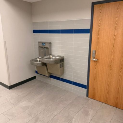 water fountain and commercial tile floors and wall